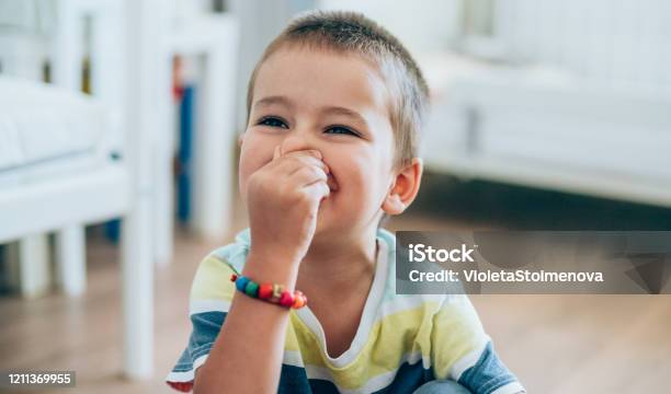 Little Boy Pinching His Nose Stock Photo - Download Image Now - Child, Unpleasant Smell, Nose