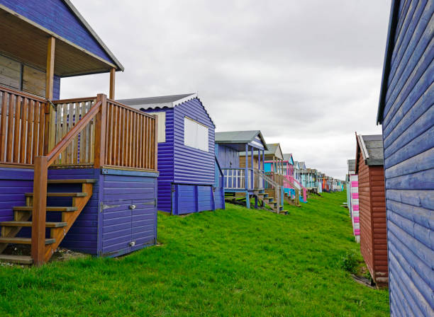 istock Two rows of colorful beach huts, Whitstable, England 1211371684
