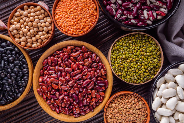 istock Fresh organic natural beans on wooden rustic background 1211372697