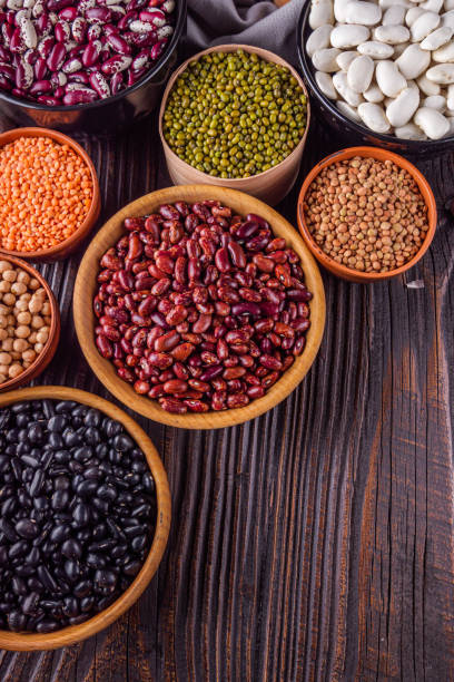 istock Fresh organic natural beans on wooden rustic background 1211372710
