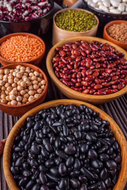 istock Fresh organic natural beans on wooden rustic background 1211372824