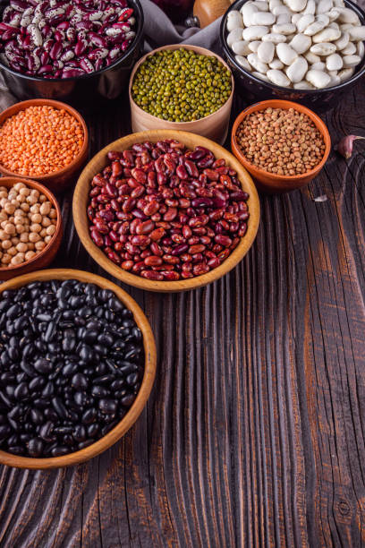 istock Fresh organic natural beans on wooden rustic background 1211372855