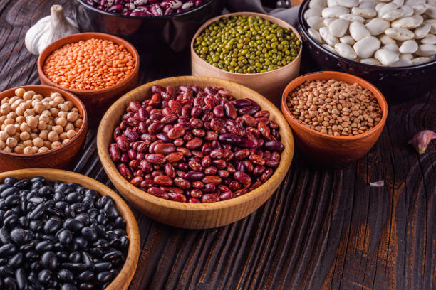 istock Fresh organic natural beans on wooden rustic background 1211373089