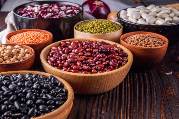istock Fresh organic natural beans on wooden rustic background 1211373699
