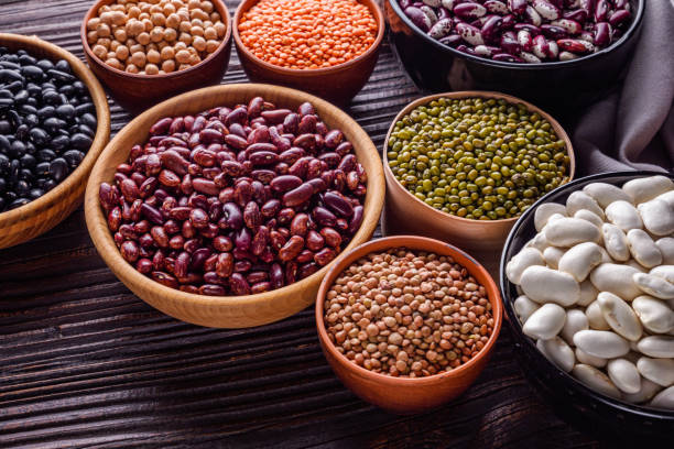 istock Fresh organic natural beans on wooden rustic background 1211373771