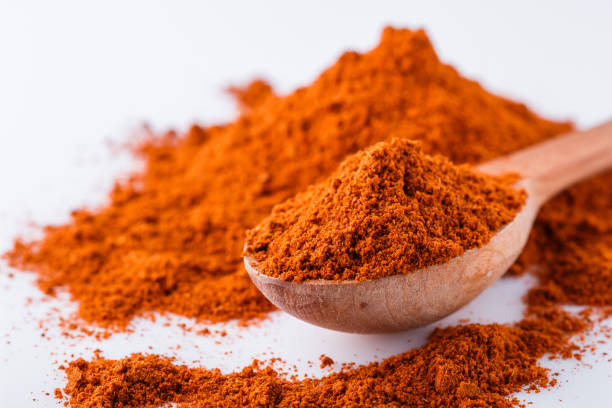 istock aromatic spicy chili powder on a white background 1211373985