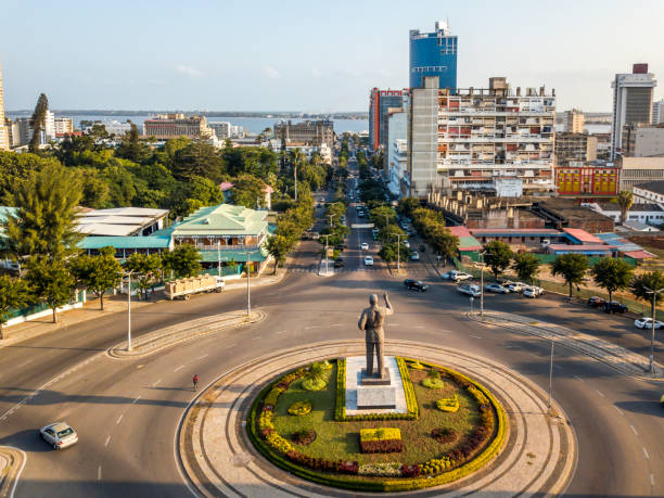 Samora Machel statue on Independence Square with the view of city downtown Maputo, Mozambique - May 22, 2019: Samora Machel statue on Independence Square with the view of city downtown mozambique stock pictures, royalty-free photos & images