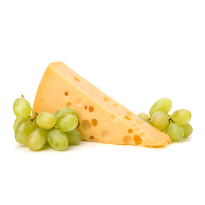 Perfect bunch of grapes and cheese  on white background