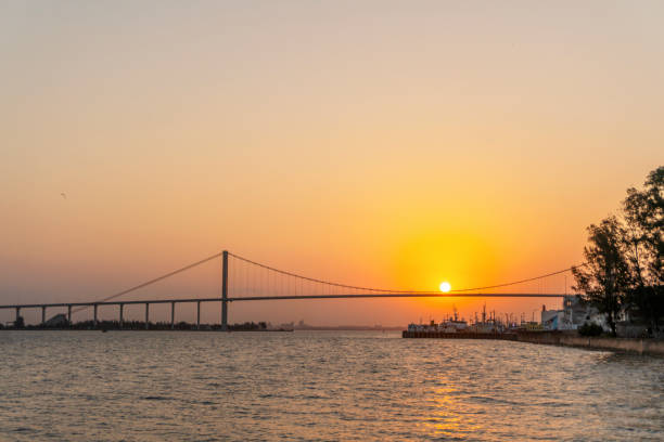 istock Sunset with The Golden Bridge in Maputo, Mozambique 1211377794