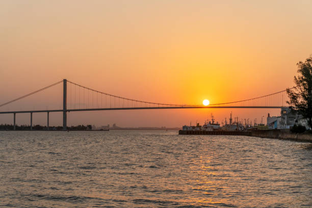 istock Sunset with The Golden Bridge in Maputo, Mozambique 1211377800