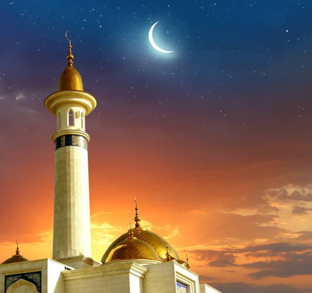 istock Ramadan Kareem background.Crescent moon at a top of a mosque 1211378558