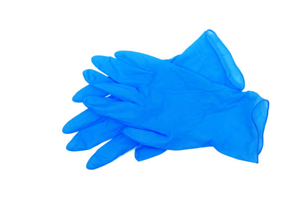 pair of blue medical gloves isolated on white background pair of blue medical gloves isolated on white background neoprene photos stock pictures, royalty-free photos & images