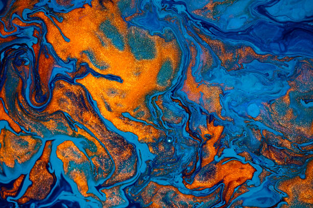 fluid art texture. abstract backdrop with mixing paint effect. liquid acrylic artwork with chaotic mixed paints. can be used for posters or wallpapers. blue, orange and golden overflowing colors. - multi layered paint imagens e fotografias de stock