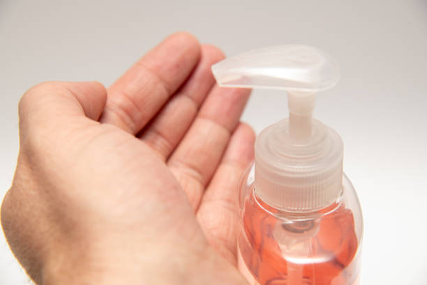 istock Clear pink hand sanitizer coronavirus protection 1211382090