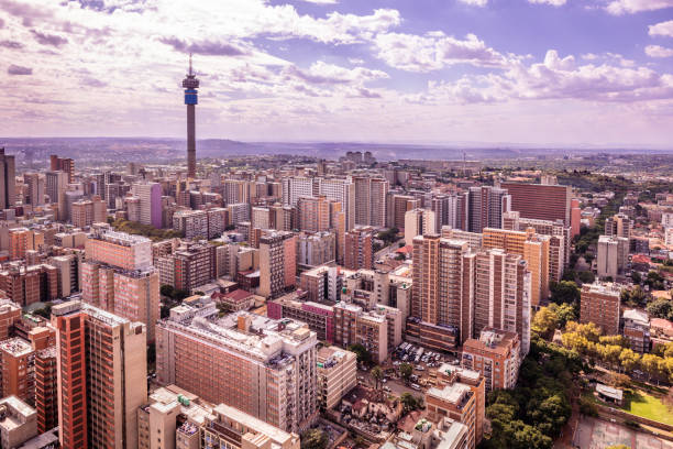 istock Apartments in Hillbrow with Telkom communication tower 1211384620