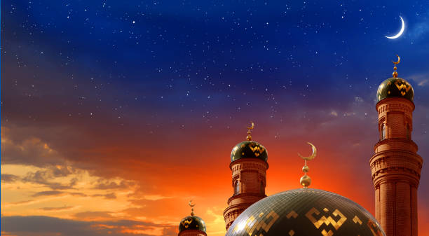 Ramadan Kareem background.Crescent moon at a top of a mosque Ramadan Kareem background.Crescent moon at a top of a mosque muhammad prophet photos stock pictures, royalty-free photos & images
