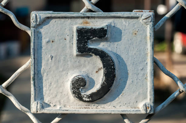 Old retro cast iron plate number 5