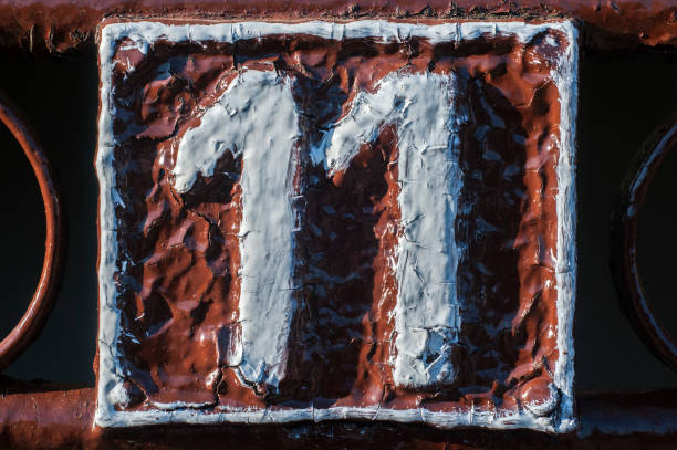 Old retro cast iron plate number 11