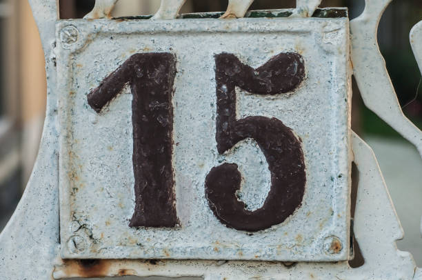 istock Old retro cast iron plate number 15 1211386507