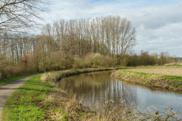 istock hiking at a small river in germany 1211386810