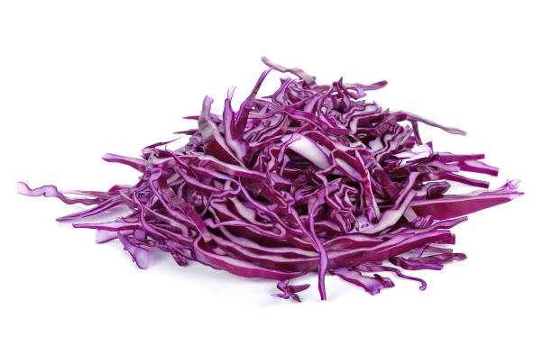 istock Sliced of red cabbage on white 1211387982