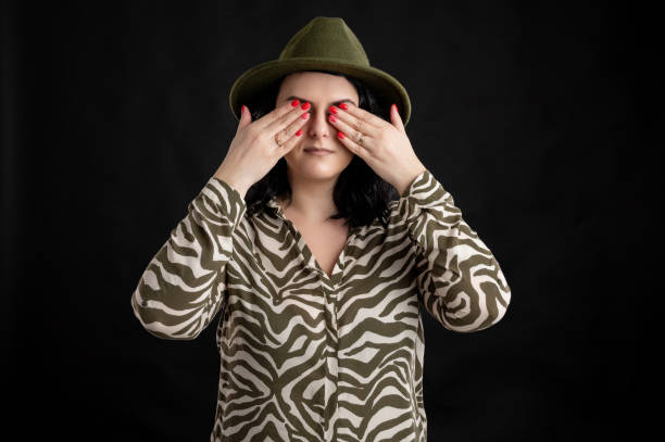 istock Attractive young woman dressed casually  in the See No Evil 1211388083