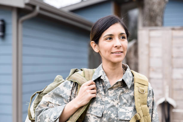 istock Female soldier leaving for assignment 1211388286