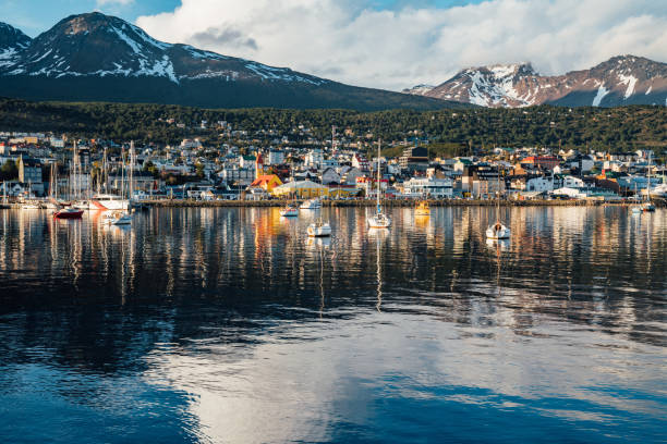 Ushuaia cityscape at sunset - Patagonia, Argentina Ushuaia cityscape at sunset - Patagonia, Argentina. View from the harbor. beagle channel stock pictures, royalty-free photos & images