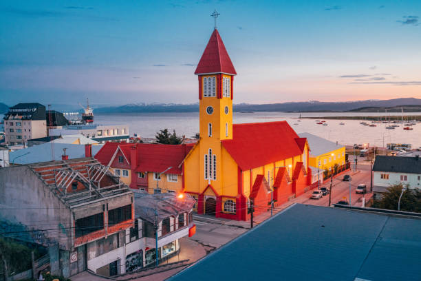 Ushuaia's church at sunset Ushuaia's church at sunset. Elevated point of view. Patagonia, Argentina. Salesian Church. beagle channel stock pictures, royalty-free photos & images