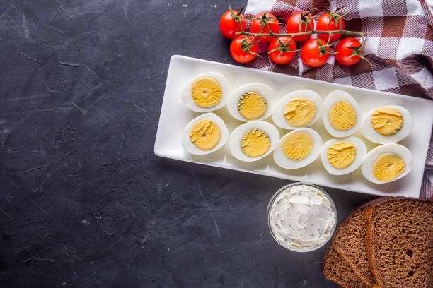 istock boiled chicken eggs on a dark stone background 1211390479