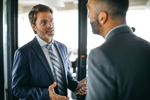 istock Business partners talking and working on a strategy concept 1211392873