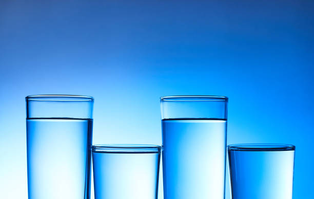 istock Water in glass on background. 1211393319