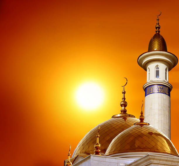 istock Ramadan Kareem background.Crescent moon at a top of a mosque 1211394342