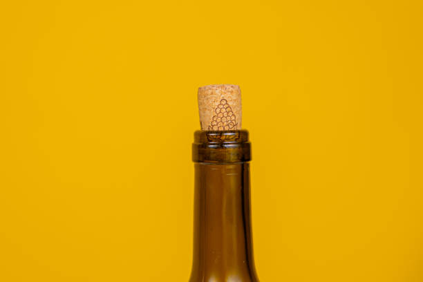 Bottle of wine on a yellow background