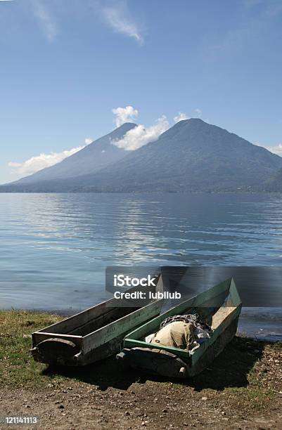 Traditional Wooden Boats By Lake Atitlan In Guatemala Stock Photo - Download Image Now