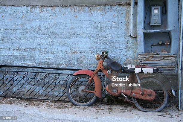 Rusty Old Motorcycle By Blue Wall In Greece Stock Photo - Download Image Now - Motorcycle, Old, The Past