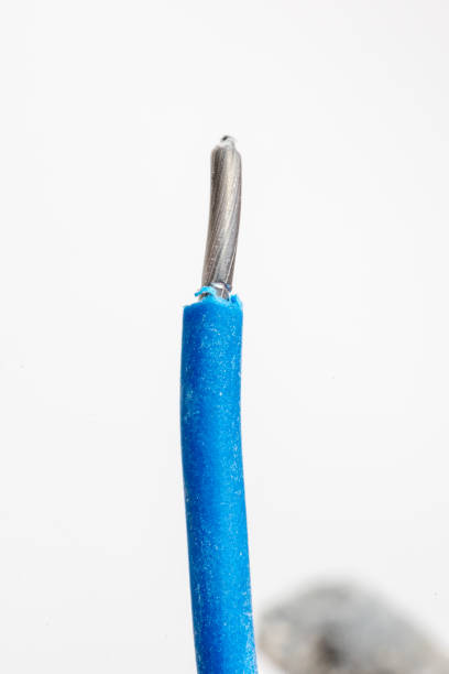 istock Close-up on blue aluminum electrical wire. 1211412468