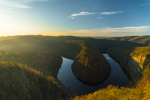 Scenic view of river in forest in Czech Republic  at sunset