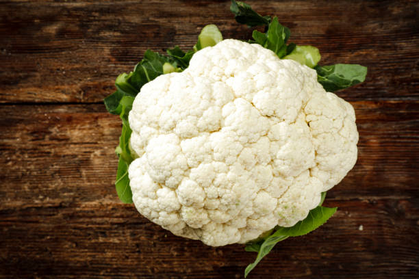 istock Fresh vegetables on wooden table background. Copy space for advertising products. 1211415233