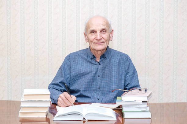 istock professor with a ballpoint pen in his hand 1211415234