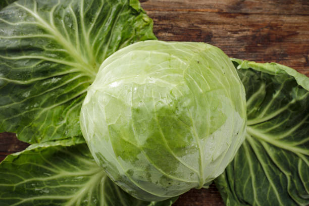 istock Fresh vegetables on wooden table background. Copy space for advertising products. 1211415766