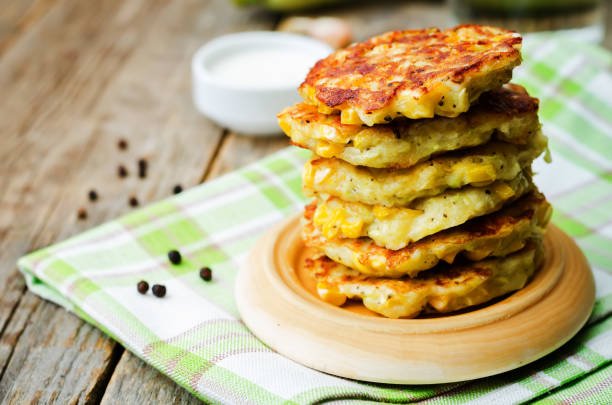 istock zucchini corn fritters on a wood background 1211420418