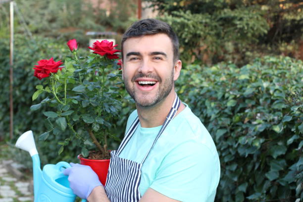 istock Cute man working on his garden 1211421023
