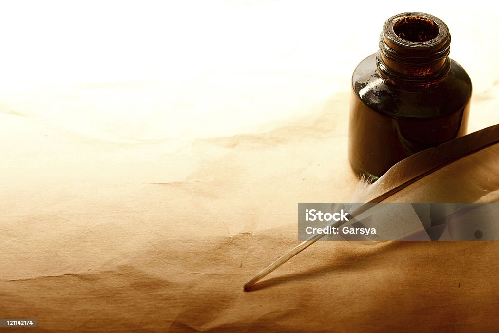 Feather and ink bottle  Black Color Stock Photo