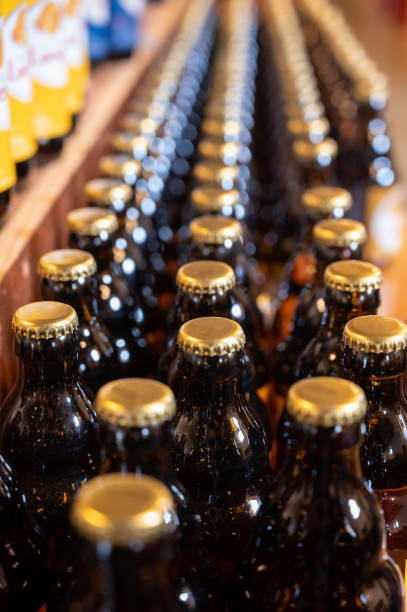 istock Many Belgian beer bottles in abbey shop 1211422918