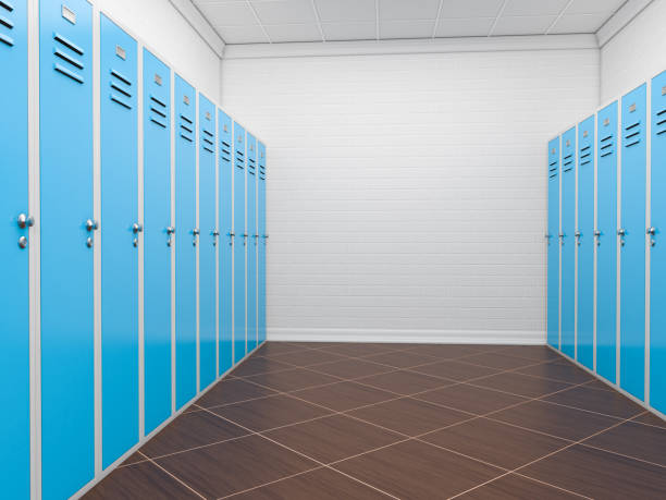 istock Blue lockers on opposite walls in an empty room. 3d rendering illustration 1211425386