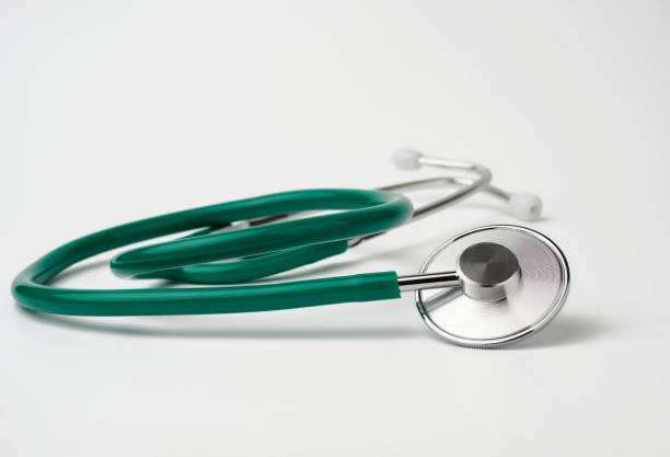 istock green medical stethoscope on white background 1211428483