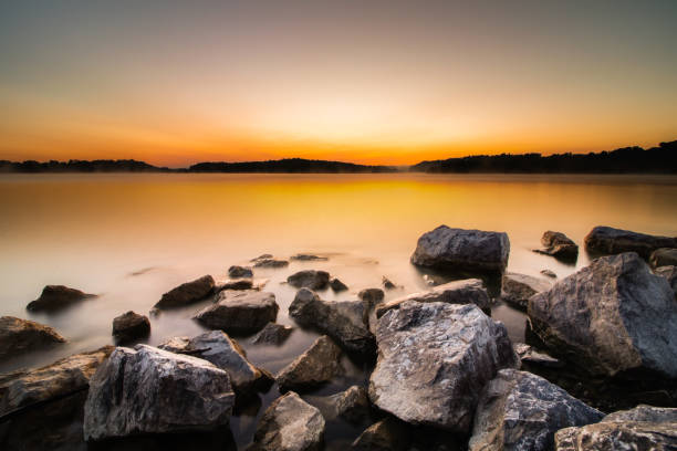 Rocky shoreline at Blue Marsh Lake just before daybreak