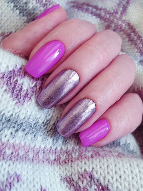 istock female hand beautiful manicure sweater 1211433497