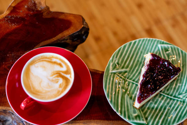 istock Beautiful cappuccino and slice of cheesecake 1211439092